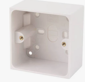 Specifically, a deep backing box for surface mount. Lots of space, heat rated plastic, handy knockouts for wire entry and screw mounting. Top with a blanking plate (or even an actual light switch or socket) and it blends right in – until someone tries to use it.