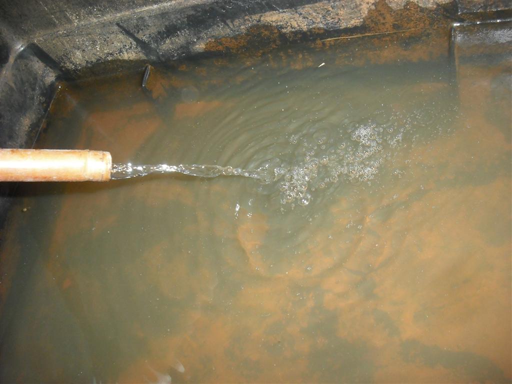 The return water into the header tank showing relatively low flow