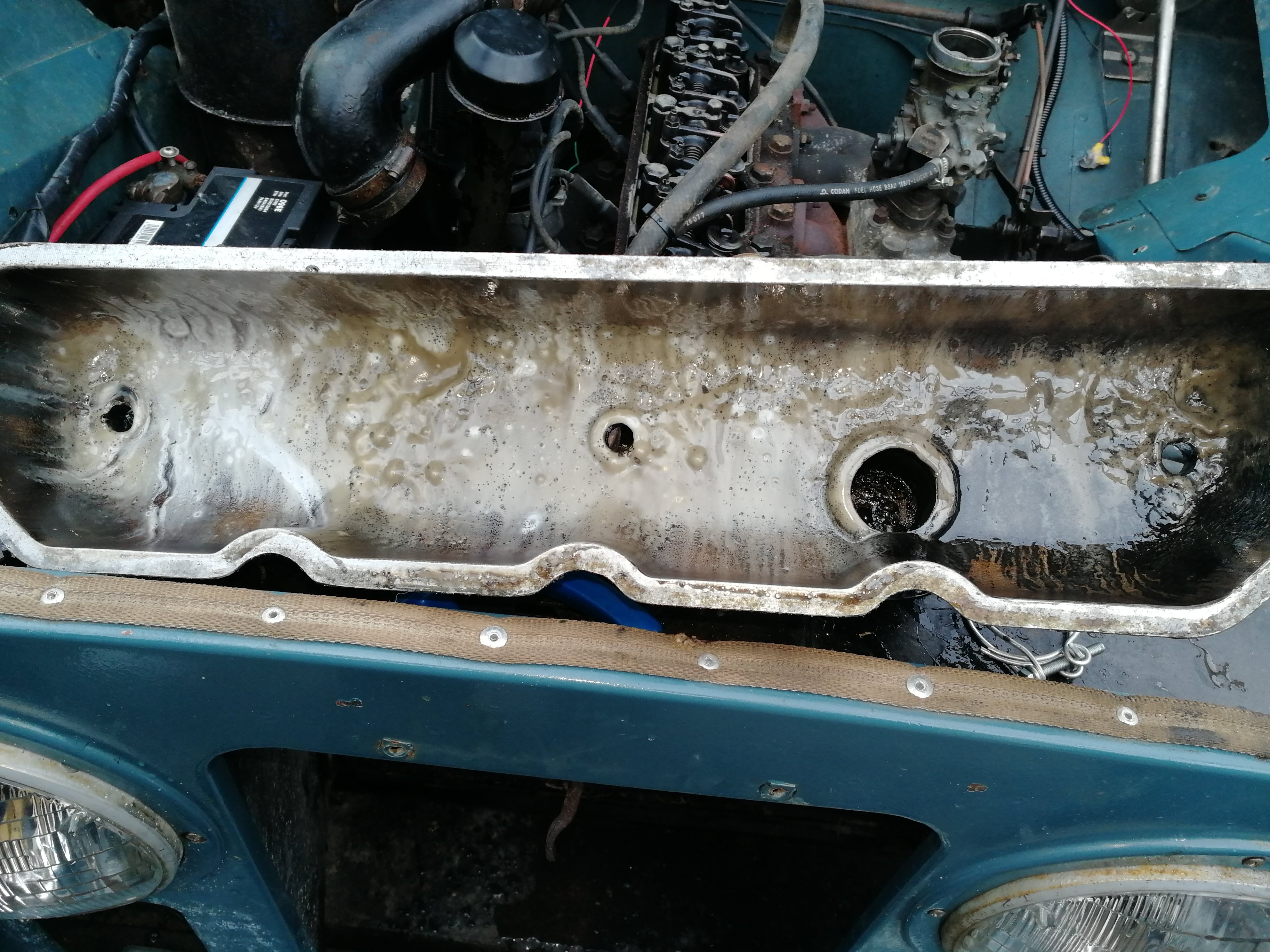 Milky deposits inside the rocker cover